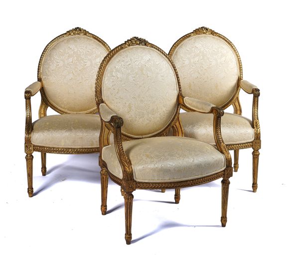 THREE LOUIS XVI STYLE GILT FRAMED OPEN ARMCHAIRS (3)