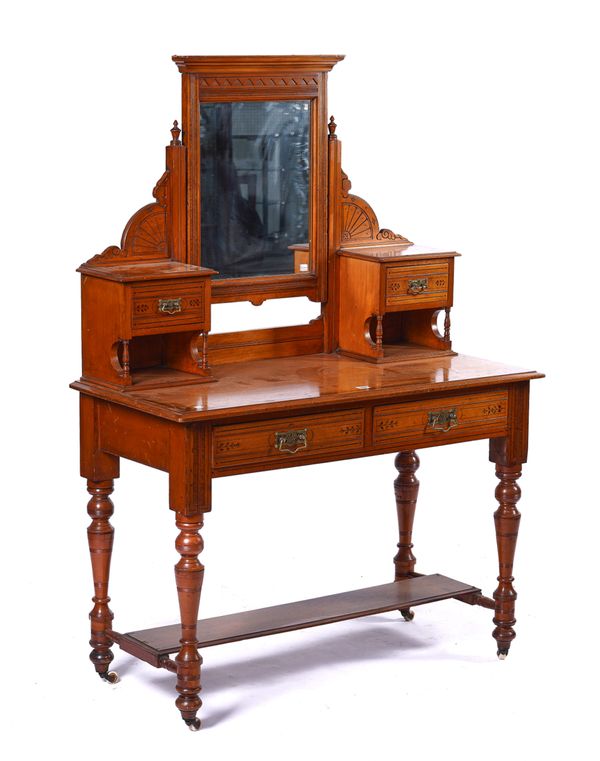 A LATE 19TH CENTURY AESTHETIC MOVEMENT DRESSING TABLE