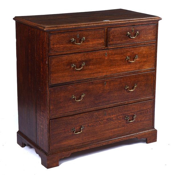 A GEORGE III OAK CHEST