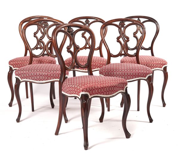 A SET OF SIX VICTORIAN ROSEWOOD BALLOON BACK DINING CHAIRS (6)