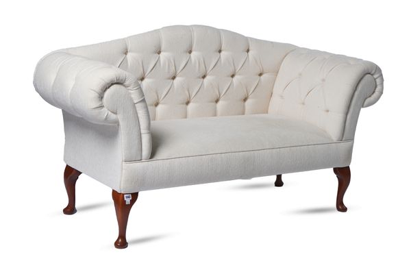 A GEORGE I STYLE HUMP BACK SOFA