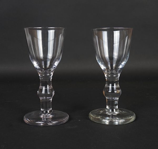 A PAIR OF UNUSUAL FIRING GLASSES (2)