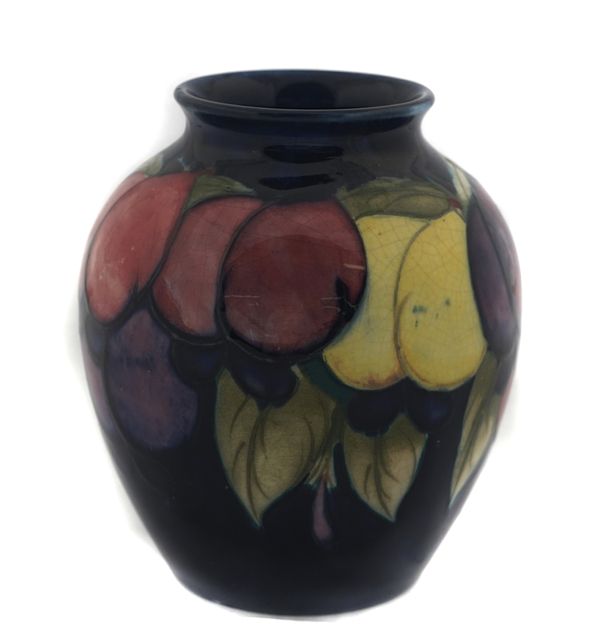 A SMALL MOORCROFT OVOID VASE