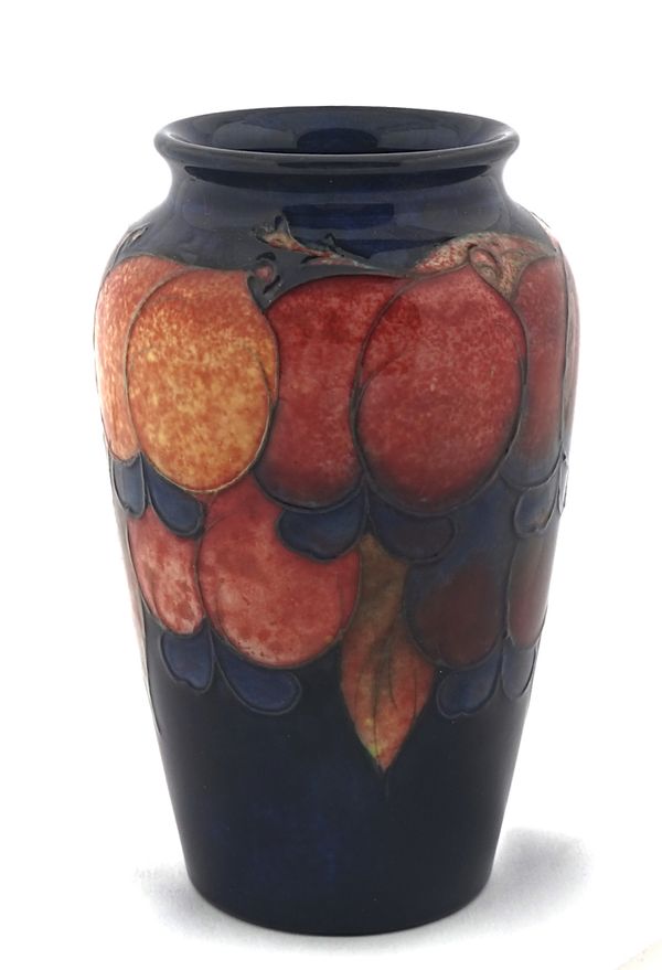 A SMALL MOORCROFT FLAMBÉ SLENDER OVOID VASE