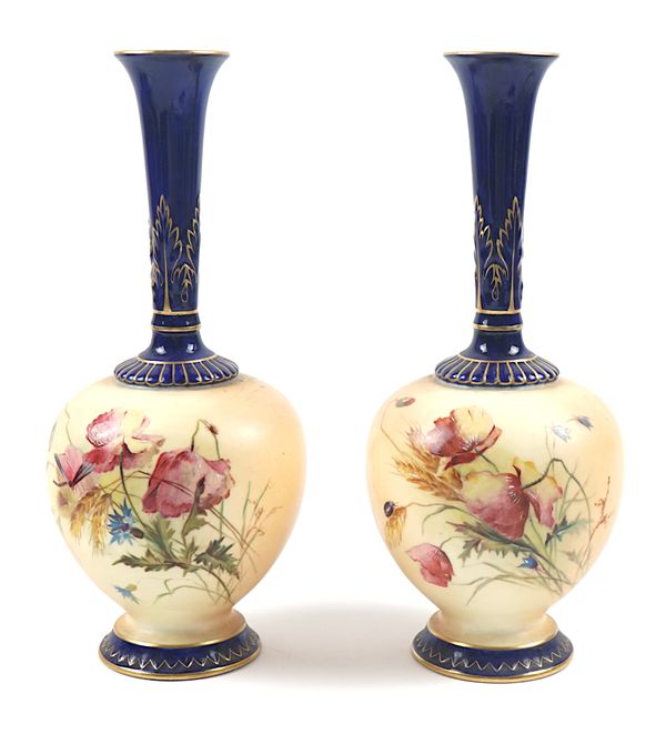 A PAIR OF ROYAL WORCESTER BOTTLE VASES (2)