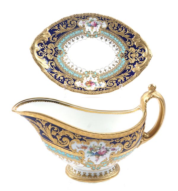 A VERY RARE AND PROBABLY UNIQUE ROYAL CROWN DERBY SAUCEBOAT AND STAND FROM THE JUDGE GARY SERVICE (2)