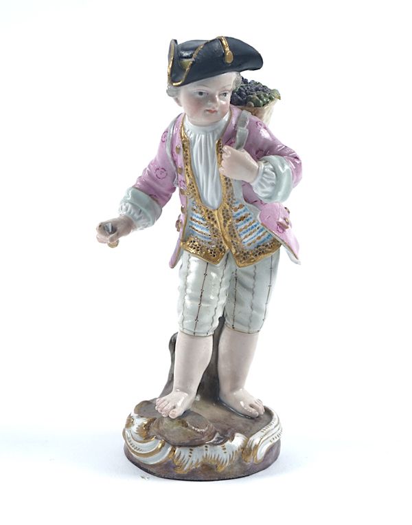 A MEISSEN FIGURE OF A CHILD VINTNER