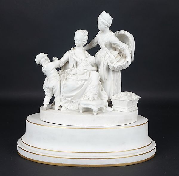 A SEVRES BISCUIT PORCELAIN GROUP OF `LA NOURRICE'