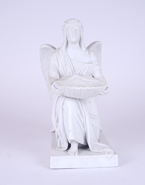 A BISCUIT FIGURE OF THE ANGEL OF BAPTISM