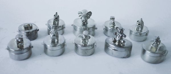 TEN SILVER OVAL HINGE LIDDED PILL BOXES (10)