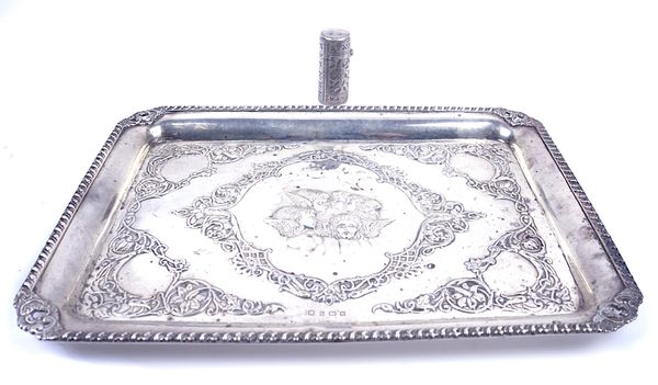 A SILVER DRESSING TABLE TRAY AND A SMELLING SALTS BOTTLE CASE (2)