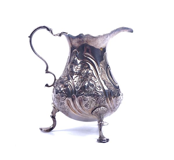 A GEORGE III SILVER CREAM JUG