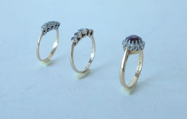 AN 18CT GOLD, RUBY AND DIAMOND CLUSTER RING AND TWO FURTHER GEM SET RINGS (3)