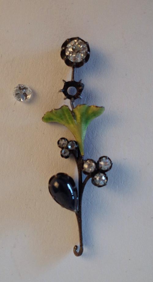 A DIAMOND, CABOCHON SAPPHIRE AND GREEN ENAMELLED PENDANT DROP