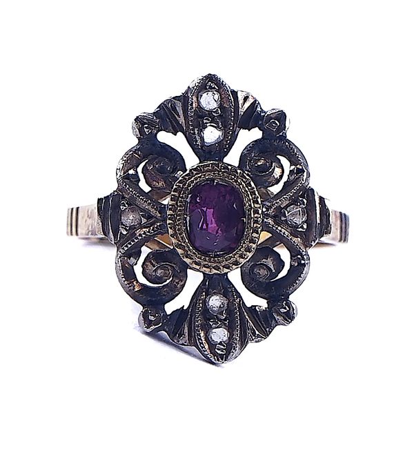 A GOLD, RUBY AND DIAMOND RING