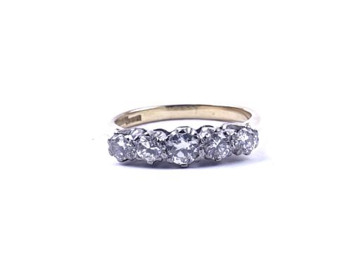 A GOLD AND DIAMOND FIVE STONE RING