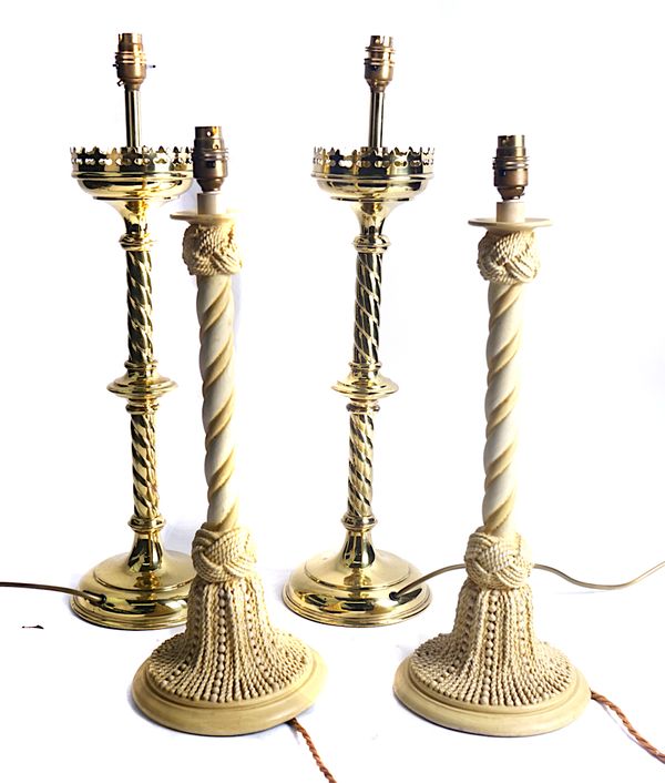 A PAIR OF GOTHIC REVIVAL BRASS CANDLESTICKS  (4)