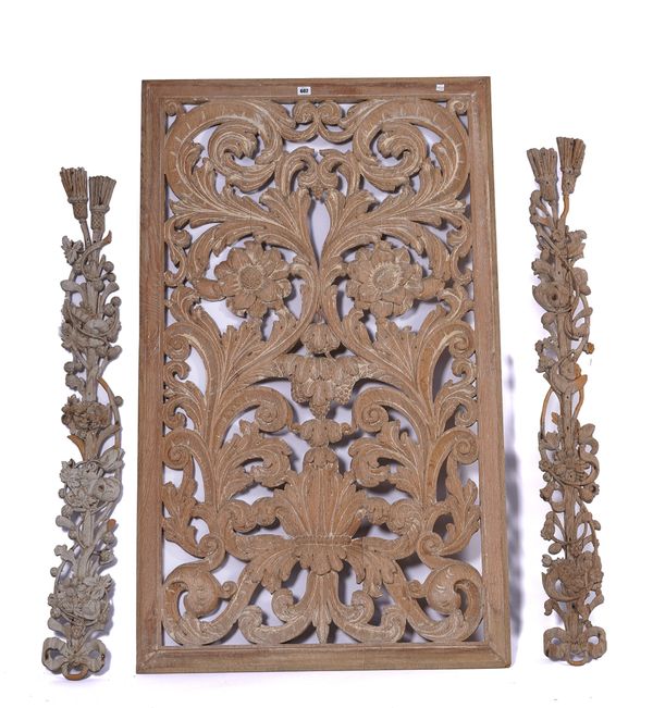 A STRIPPED AND LIMED OAK CARVED PANEL (3)