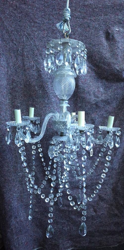 A CUT-GLASS FIVE LIGHT CHANDELIER
