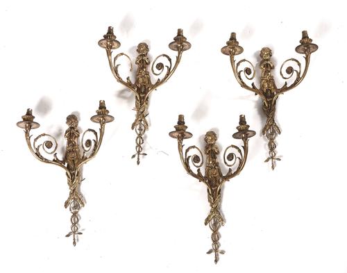 A SET OF FOUR LOUIS XVI STYLE GILT-METAL TWIN LIGHT WALL APPLIQUÉS (4)