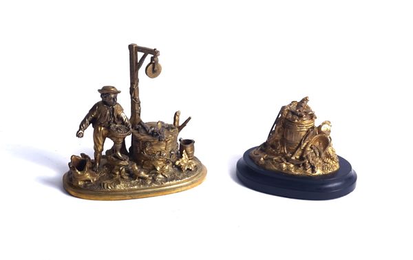 AN ENGLISH GILT-BRONZE FIGURAL INKWELL AND ANOTHER (2)