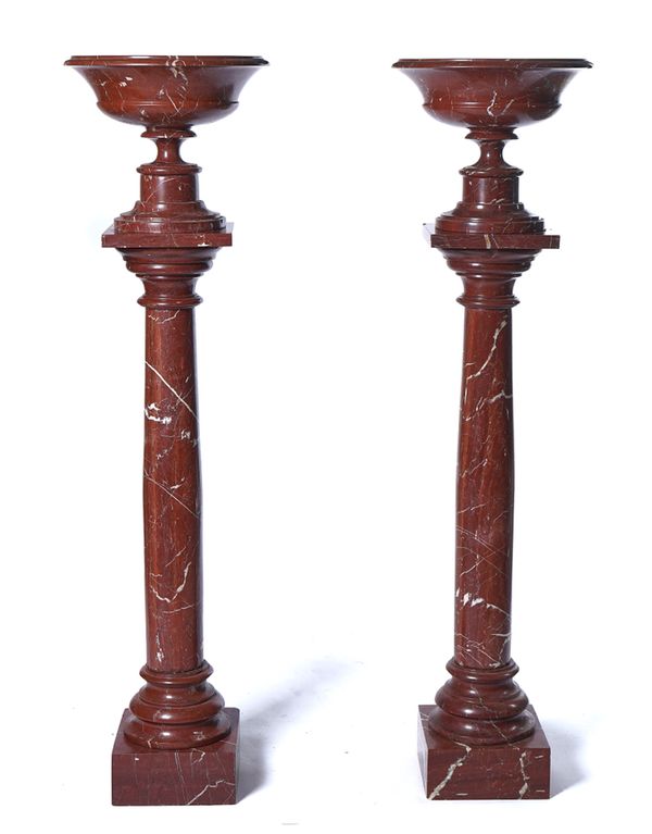 A PAIR OF ‘GRAND TOUR’ LIVER RED MARBLE URNS ON PEDESTALS (4)