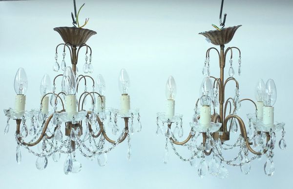 A PAIR OF GILT TOLEWARE AND GLASS FIVE LIGHT CHANDELIERS (2)