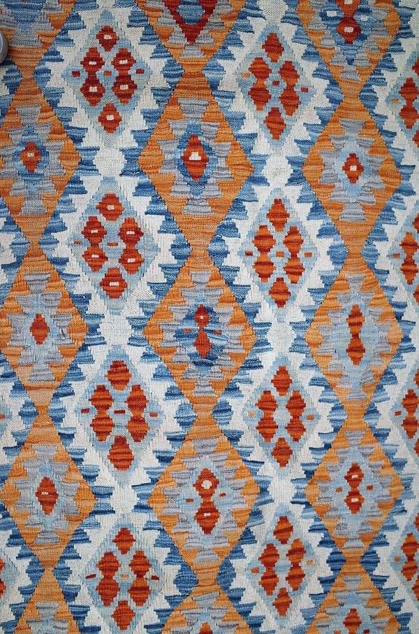 AN ANATOLIAN DESIGN KILIM CARPET