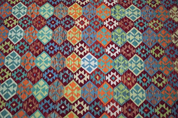 A LARGE ANATOLIAN  DESIGN KILIM CARPET