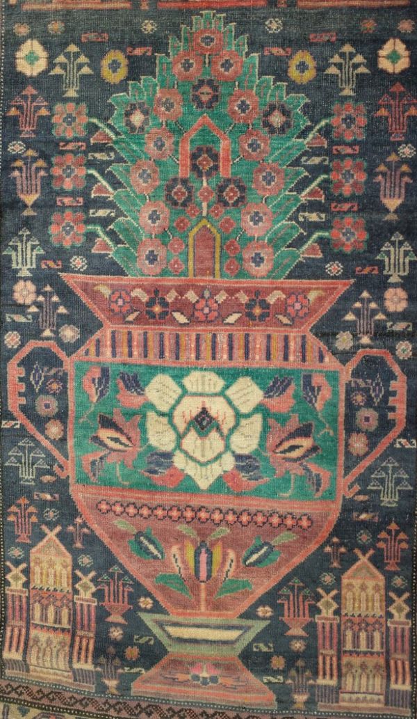 A BELUCHE VASE RUG