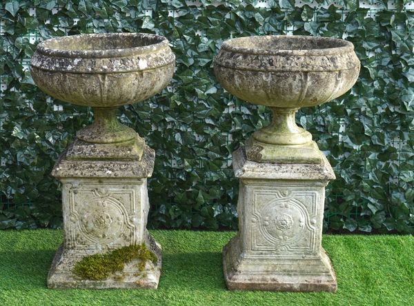 A PAIR OF RECONSTITUTED STONE SHALLOW CIRCULAR JARDINIERES (2)