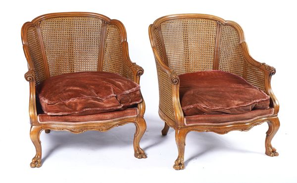 A PAIR OF MID 20TH CENTURY STAINED BEECH TUB BACK EASY ARMCHAIRS (2)