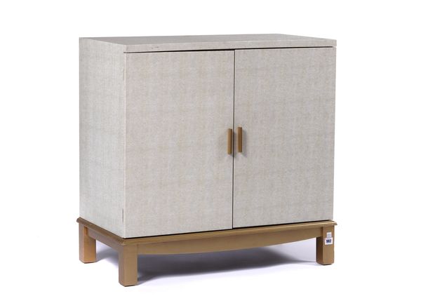 A MODERN PARCEL GILT AND FAUX SHAGREEN TWO DOOR SIDE CABINET