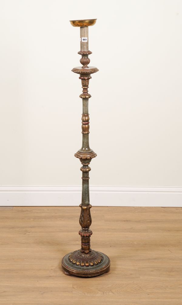 A FLOOR STANDING POLYCHROME PAINTED CANDLESTICK OF 17TH CENTURY ITALIAN DESIGN