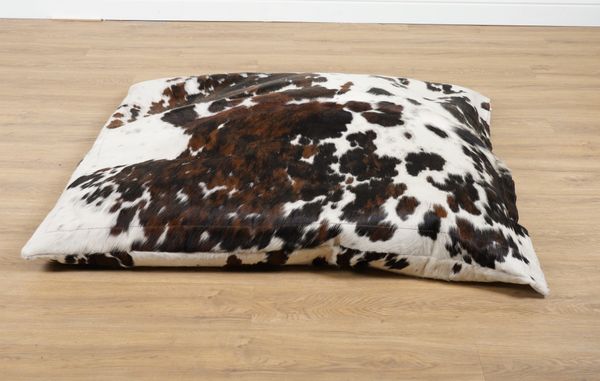 A COWHIDE UPHOLSTERED BEANBAG