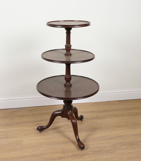 A GEORGE III GRADUATED CIRCULAR MAHOGANY THREE TIER DUMB WAITER ON TRIPOD BASE