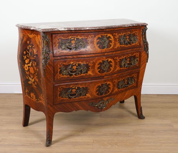 A LOUIS XV STYLE GILT METAL MOUNTED FLORAL MARQUETRY INLAID KINGWOOD MARBLE TOPPED COMMODE WITH THREE DRAWER BOMBE BASE