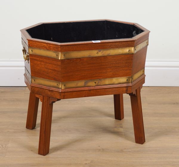 AN 18TH CENTURY STYLE BRASS BOUND HARDWOOD WINE COOLER OF COMPRESSED OCTAGONAL FORM