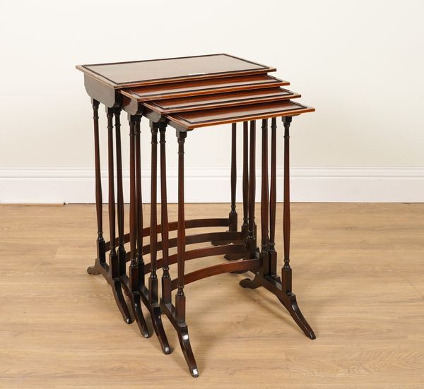 A NEST OF FOUR 19TH CENTURY MAHOGANY OCCASIONAL TABLES ON TURNED SUPPORTS (4)