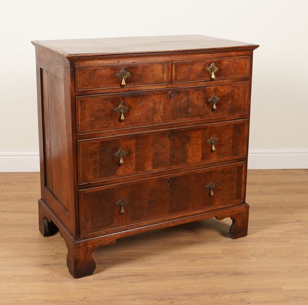 A MID 18TH CENTURY WALNUT FIVE DRAWER CHEST OF DRAWERS ON BRACKET FEET