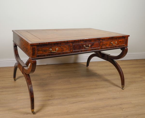 A 19TH CENTURY ROSEWOOD SIX DRAWER CENTRE LIBRARY TABLE ON X-FRAME SUPPORTS