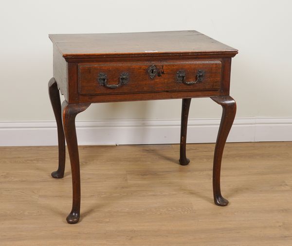 AN 18TH CENTURY MAHOGANY SINGLE DRAWER LOWBOY ON PAD FEET