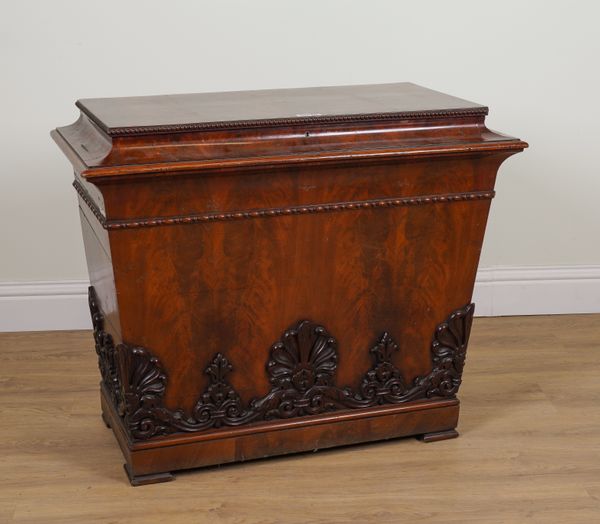 A LARGE REGENCY MAHOGANY VENEERED CAMPHOR WOOD SARCOPHAGUS FORM LIFT-TOP BOX