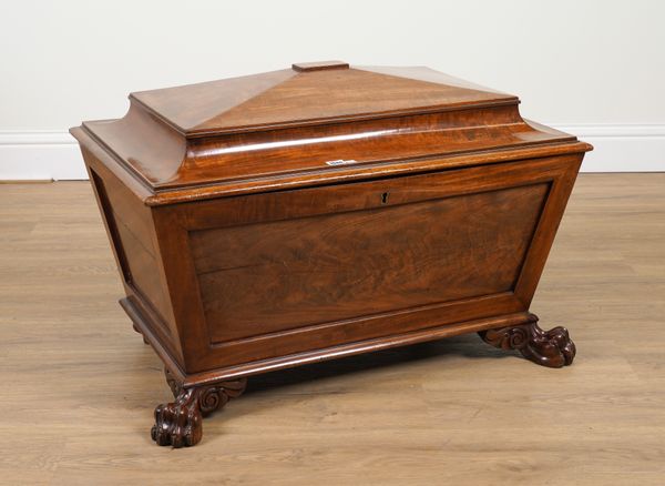 A REGENCY MAHOGANY SARCOPHAGUS SHAPED CELLARETTE