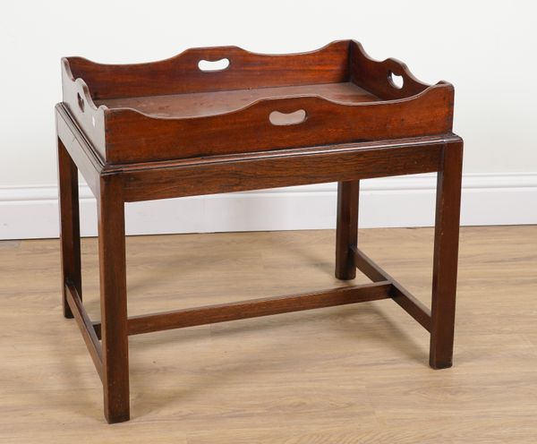 A 19TH CENTURY RECTANGULAR MAHOGANY BUTLER’S TRAY ON STAND