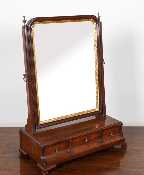 A MID 18TH CENTURY PARCEL GILT MAHOGANY TOILET MIRROR WITH CUSHION THREE DRAWER BASE