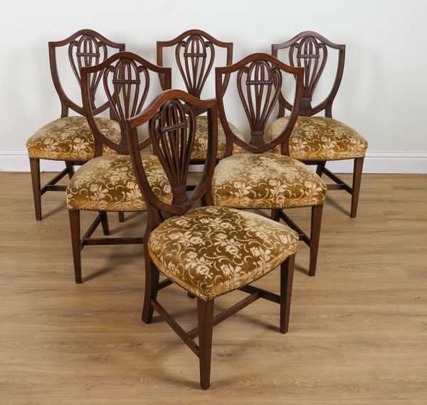 A SET OF SIX GEORGE III MAHOGANY SHIELD BACK DINING CHAIRS (6)