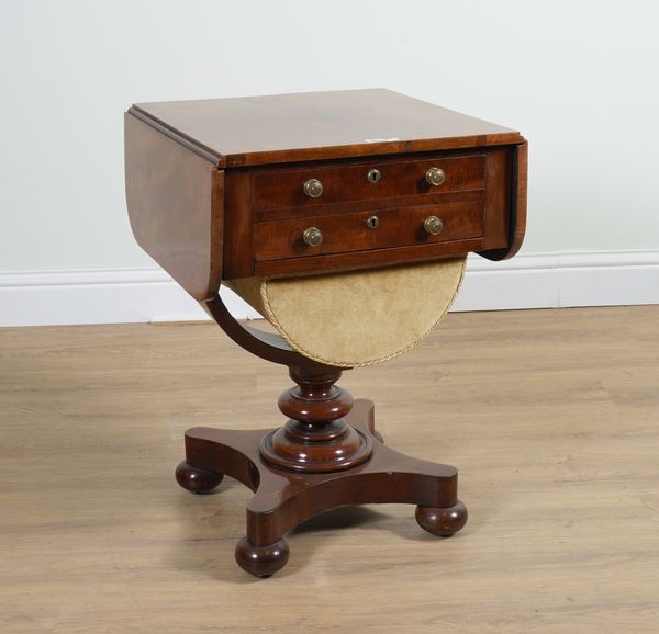 A LATE REGENCY MAHOGANY DROP FLAP WRITING/WORK TABLE ON QUATREFOIL BASE