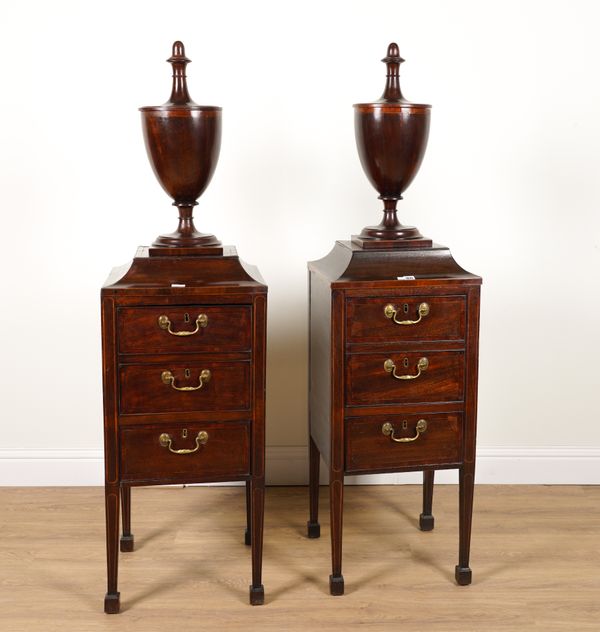 A PAIR OF GEORGE III INLAID MAHOGANY TWO DRAWER PEDESTALS WITH LATER URN MOUNTS (2)