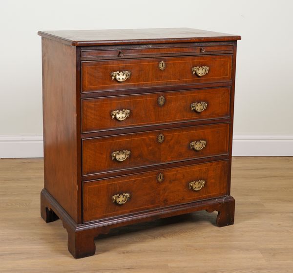 A GEORGE I STYLE INLAID WALNUT FOUR DRAWER CHEST OF DRAWERS